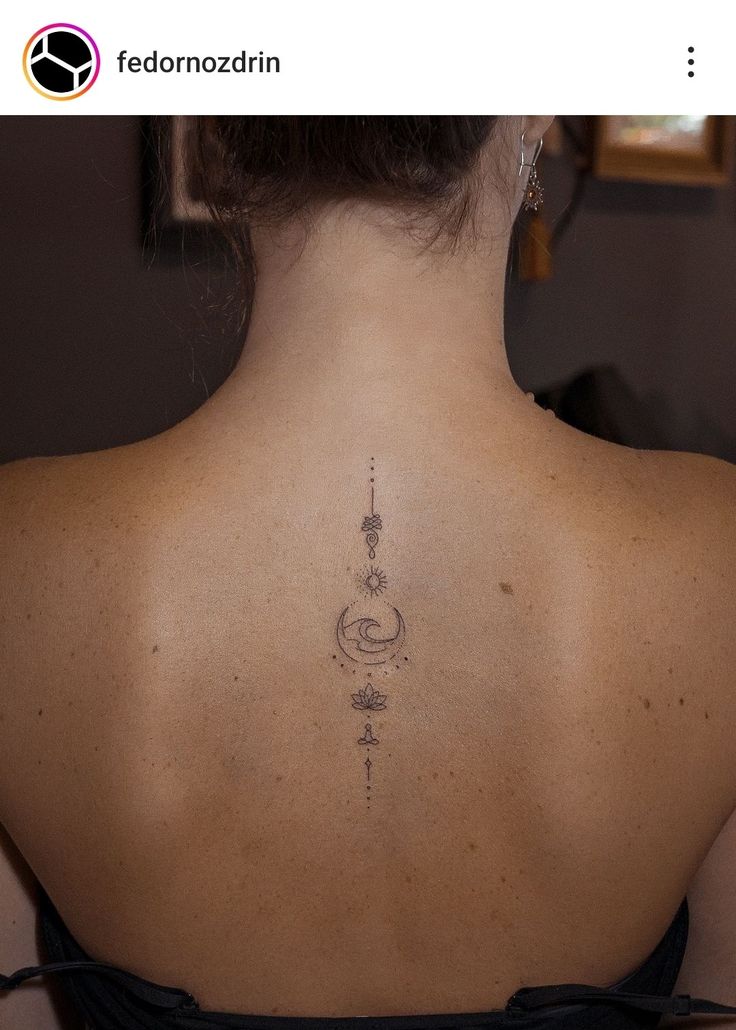 a woman with a tattoo on her back