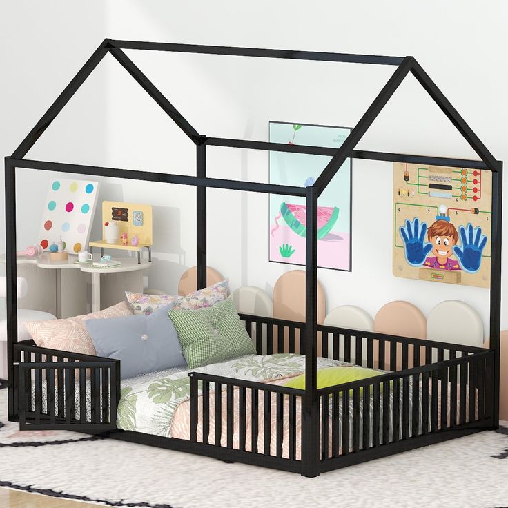 a child's bedroom with a bed and play house