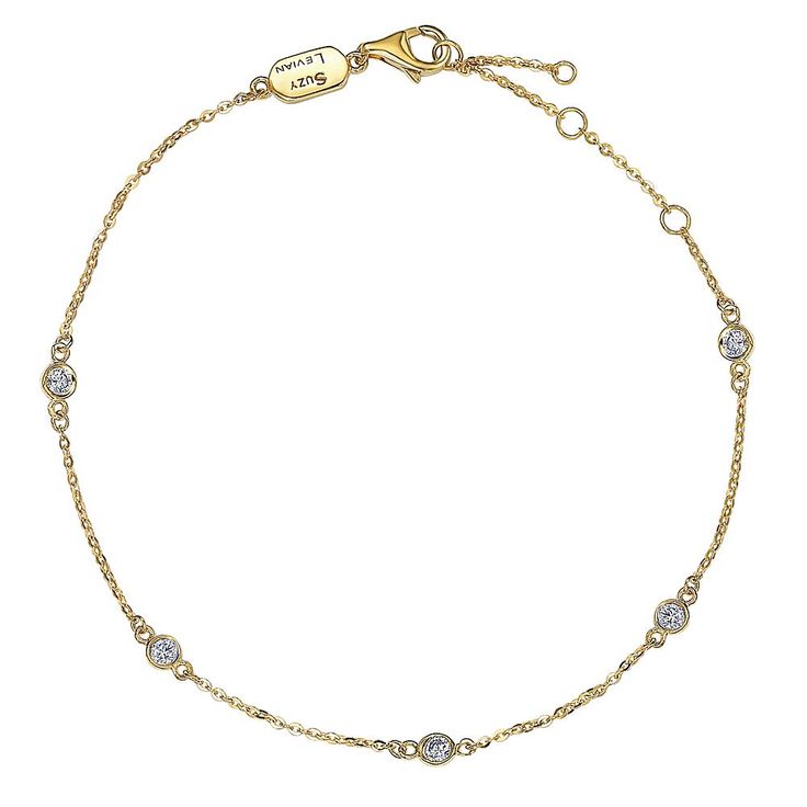 Suzy Levian 14K Gold 0.25ctw Diamond Bezel Station Bracelet A lovely wardrobe-builder, this station bracelet features round-cut diamonds, each tucked into a sleek bezel setting. Perfect as both an everyday and special-day piece that's worn alone or layered with other bracelets.       Clasps at approx. 6-1/2"L, 7"L and 7-1/2"L     Stamped 14K gold; polished      Cable-link chain with extender links and lobster-claw clasp    Stone Information       All sizes and weights approximate     Total Carat Polish Style, Levian Jewelry, Gemstone Brooch, Station Bracelet, Cubic Zirconia Bracelet, Cubic Zirconia Jewelry, Jewelry Rings Diamond, Gemstone Necklace Pendant, Bezel Diamond