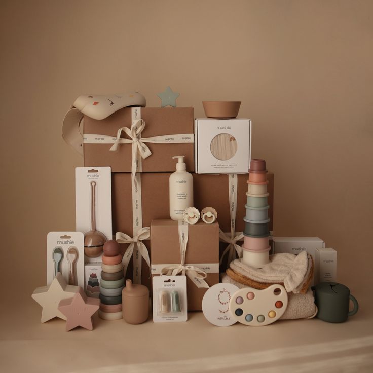 an assortment of items are displayed on a shelf in front of a brown background,