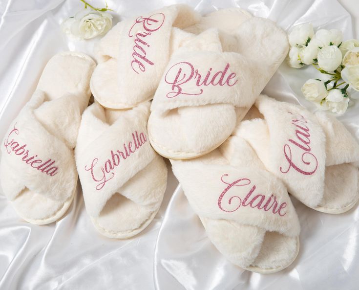 the bride and groom slippers are laid out