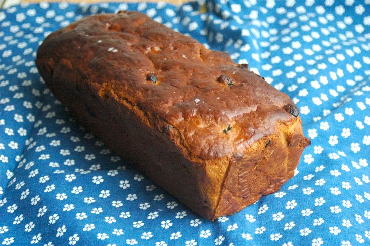 a loaf of bread sitting on top of a blue cloth