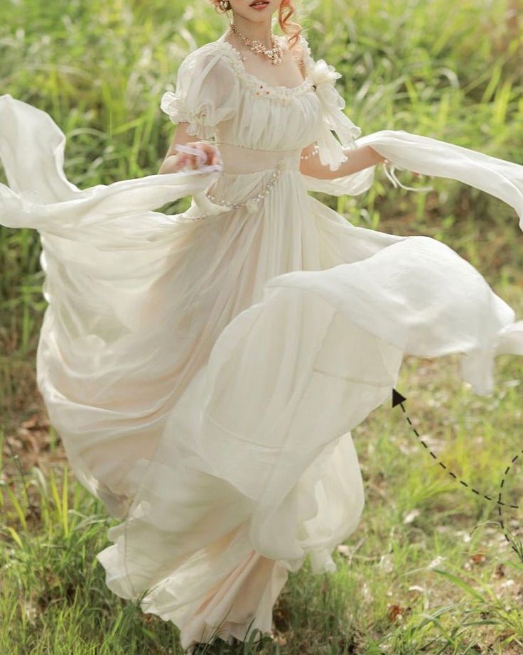 White Chiffon Dress For Garden Party, White Ethereal Prom Dress, Feminine Fairy Wedding Dress, Ethereal Floor-length Dress For Debutante Ball, Chiffon Banquet Dress With Empire Waist, Chiffon Empire Waist Dress For Banquet, Ethereal White Bridesmaid Dress, Elegant Fairy Dress Ball Gown For Wedding, Elegant Ball Gown Fairy Dress For Wedding