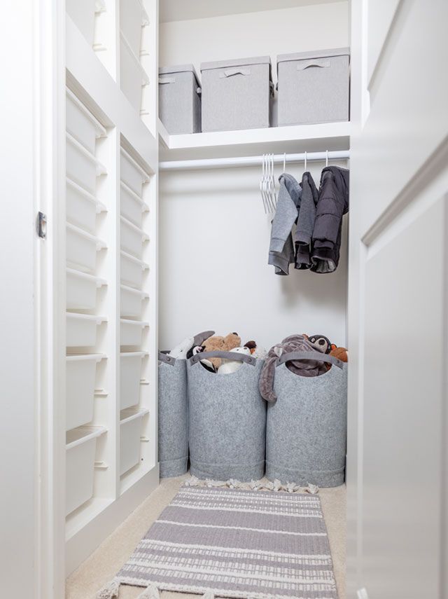 the closet is clean and ready to be used as a storage area for clothing or other items