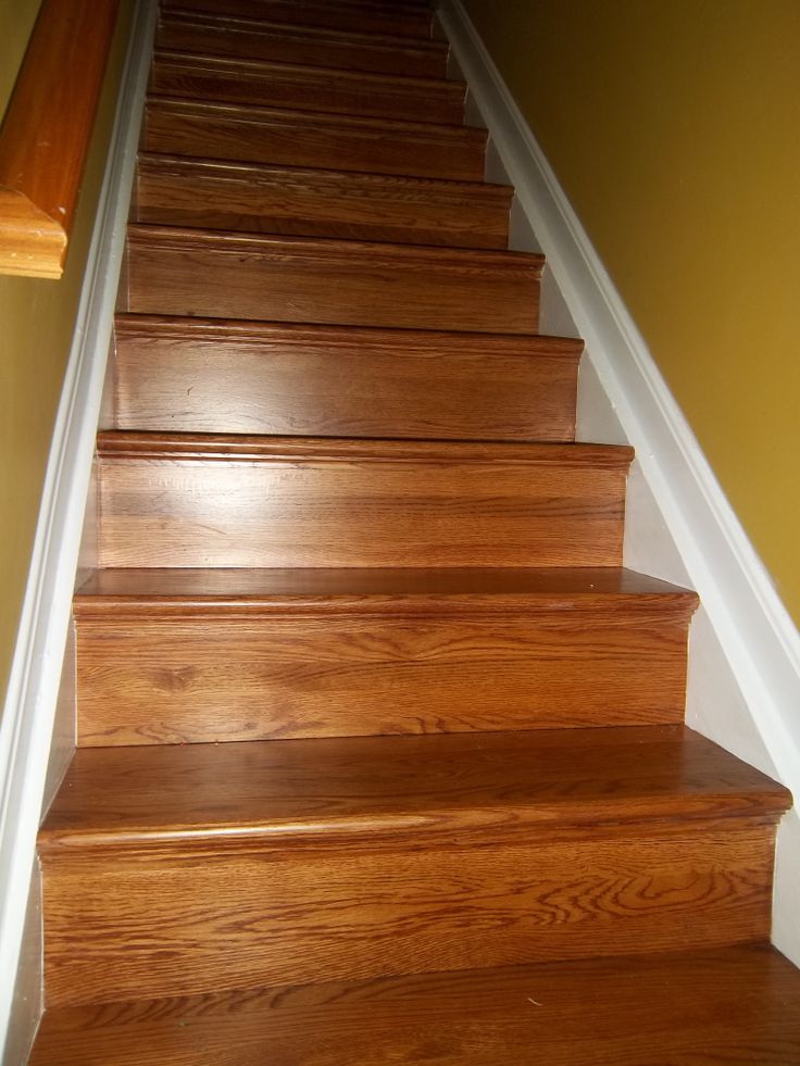 there is a wooden stair case in the house