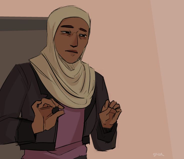 a woman in a hijab holding her hands together