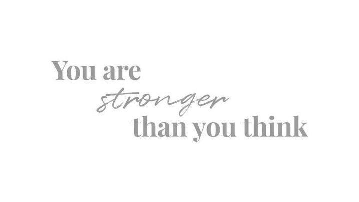 the words you are stronger than you think written in grey ink on a white background