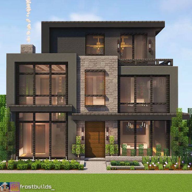 a large modern house with lots of windows