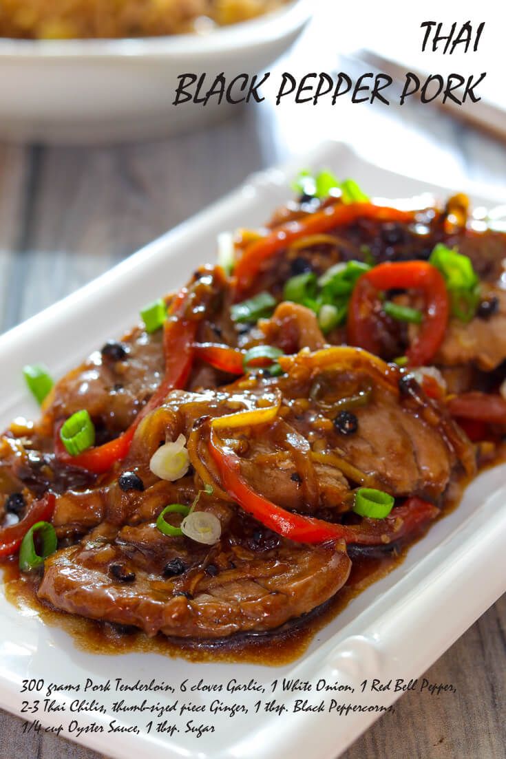 a white plate topped with meat and vegetables