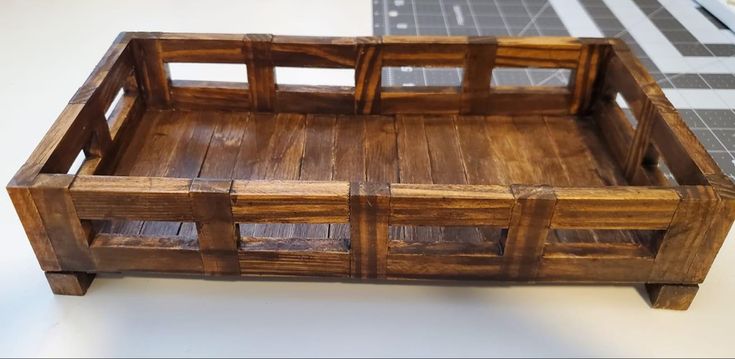 a wooden tray sitting on top of a table