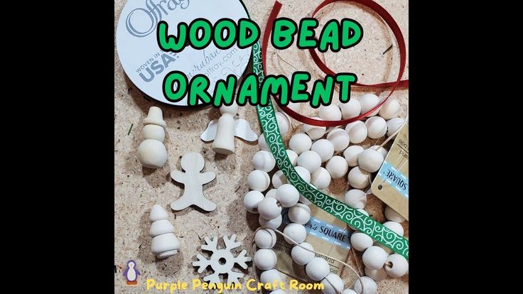 an assortment of wood bead ornament beads and other crafting supplies on a table