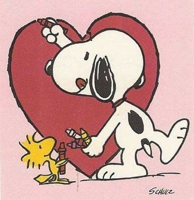 a drawing of a snoopy holding a heart with a little chickling next to it