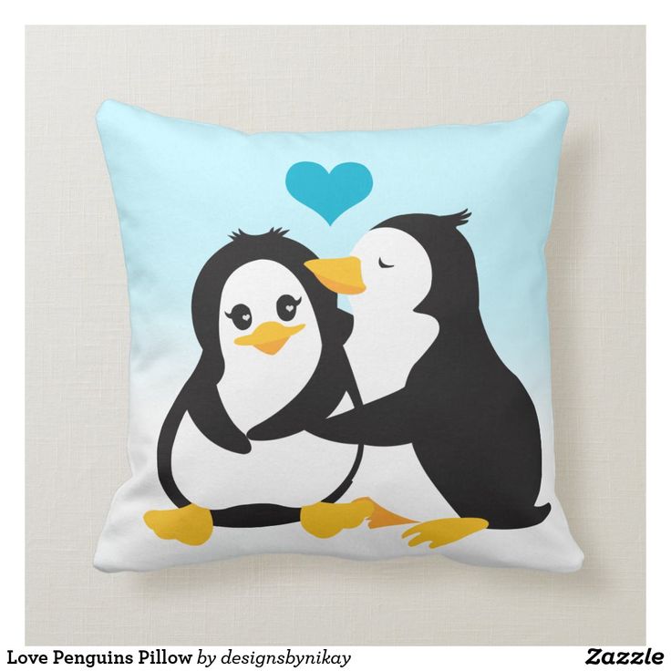 two penguins hugging each other on a blue background pillow with hearts in the sky behind them