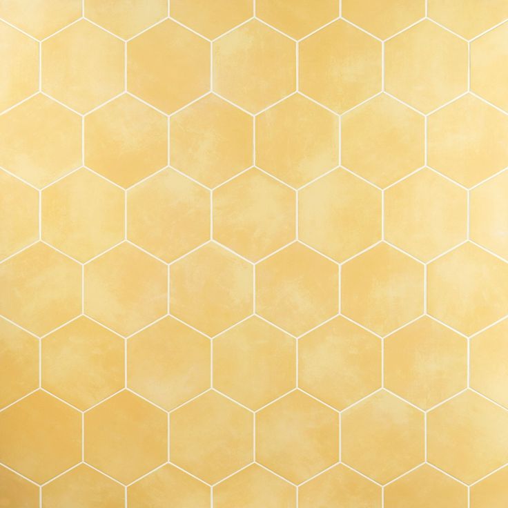 an abstract yellow background with hexagonal tiles