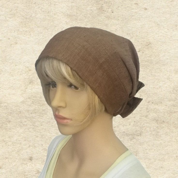 This women's head covering made of a lovely lightweight linen.  It's a great coverage, stays on head with no slipping and sliding.  This bandana  is designed to be worn easily,  there's absolutely no tying or closing involved. Just put a hat on and go! This headwrap is an elegant addition for everyday wear.  100% linen One size fits an average women's head. The hat has an elastic inner band for comfort and stability. Hand washable; please air dry. *Colors might vary slightly from print to print and from your screen. Adjustable Summer Bonnet, Adjustable One Size Bonnet For Summer, Brown Cotton Hat One Size, Lightweight Beanie Hat, Spring Adjustable Headwrap, Casual Summer Bonnet, Casual Brown Adjustable Headwrap, Casual Brown Adjustable Bandana, Casual Brown Bandana One Size Fits Most