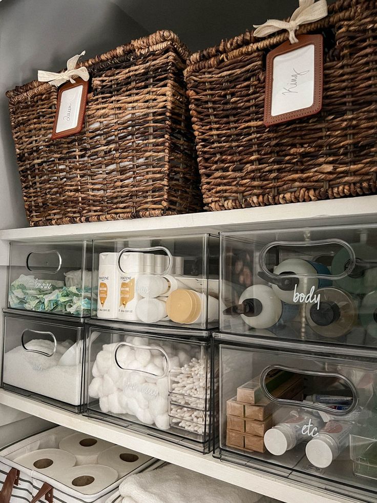 the shelves are organized with baskets, toiletries and other items to keep them clean