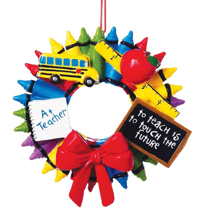 a school bus ornament hanging on a wall with a teacher's appreciation sign