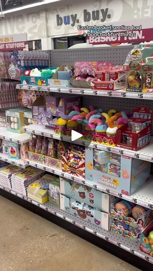 an aisle in a toy store filled with toys