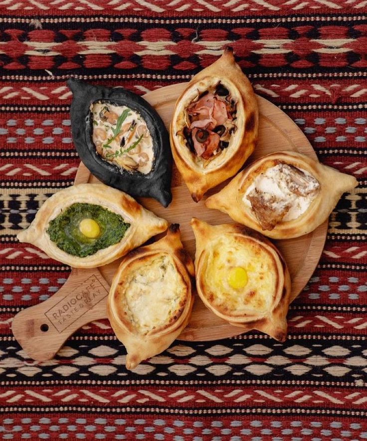 several different types of food on a wooden platter