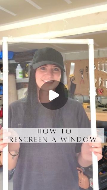 a woman holding up a frame with the words how to recover a window in it