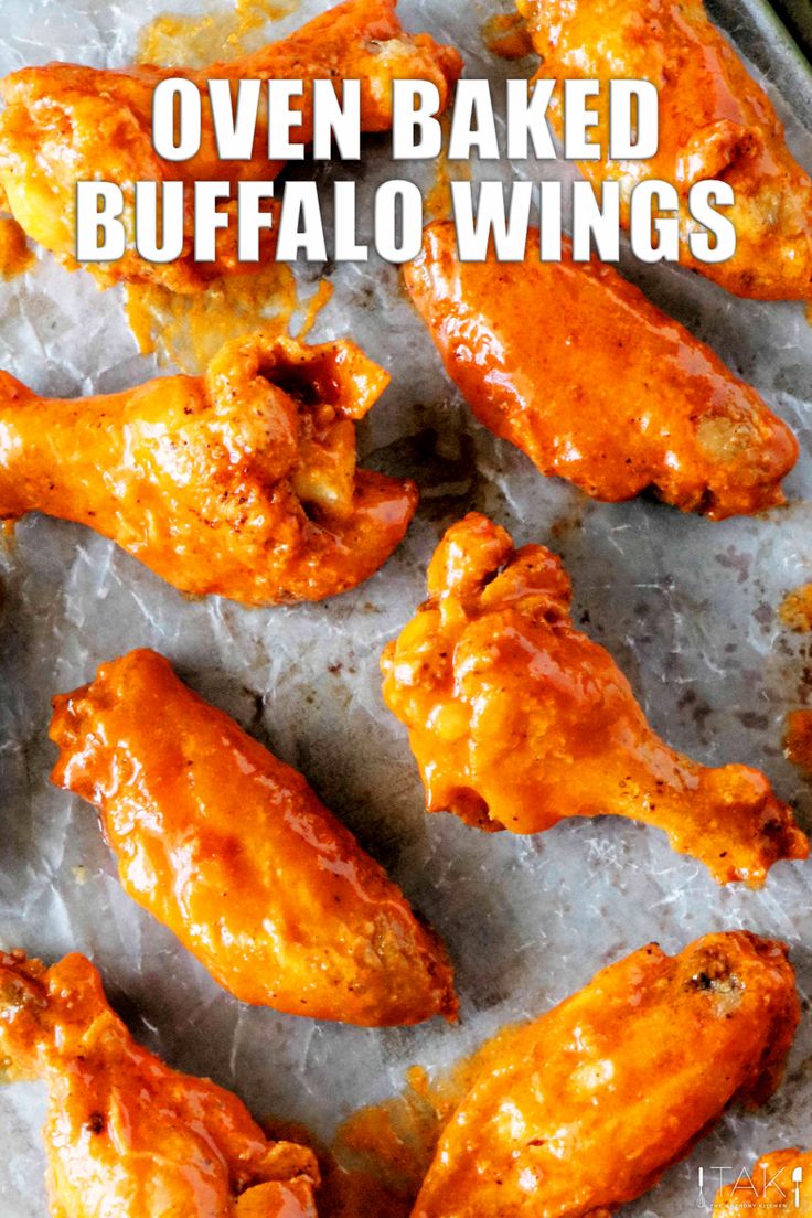 oven baked buffalo wings on ice with text overlay that reads oven baked buffalo wings