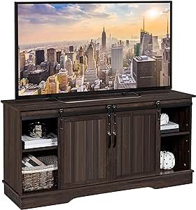 an entertainment center with a flat screen tv on it