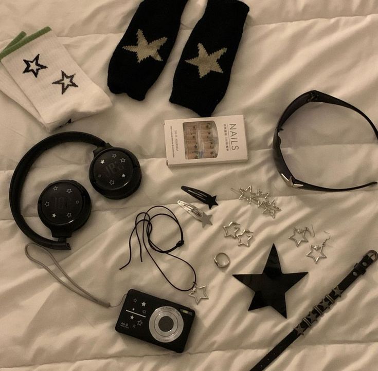 Acubi core aesthetic black and white stars star accessories headphones camera what’s in my bag. Acubi Aesthetic, Star Core, Y2k Vibes, My Core, Music Aesthetic, Black And White Aesthetic, Love Stars, Star Girl, White Aesthetic