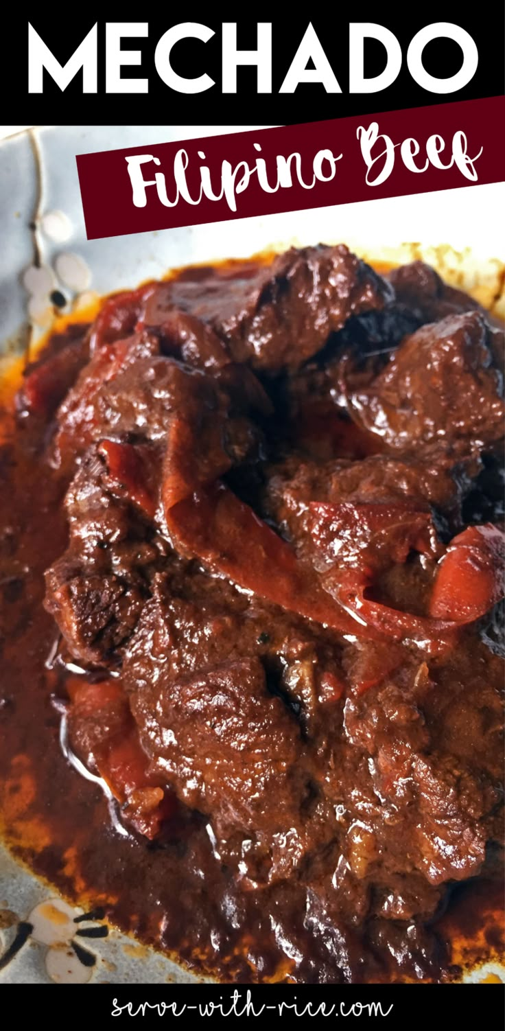 a close up of a plate of food with meat and vegetables in sauce on it