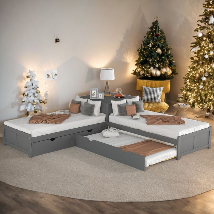 a living room filled with furniture and a christmas tree