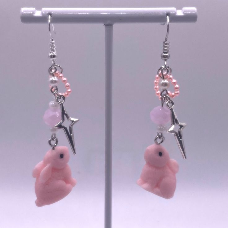 ♡ Cute earrings featuring beads inspired by pink bunny charms ! ↝ All earrings are made by me, by hand!! All are one of a kind, as I don't do exact replicas of any of them once they sell out! Due to Handmade nature, there may be some imperfections. Please treat with care ! Please message me with any questions, concerns, or cancellations (before shipped out). Coquette Earrings Pink, Pink Fairycore Earrings As Gift, Adjustable Kawaii Dangle Earrings, Kawaii Drop Earrings, Kawaii Pink Dangle Earrings, Pink Kawaii Drop Earrings, Bunny Earrings, Kawaii Jewelry, Cute Bunny