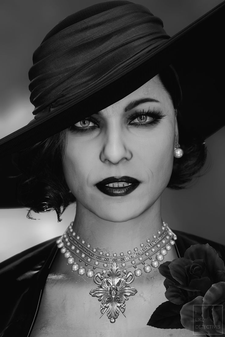 black and white photograph of a woman in a hat with pearls on her neck, wearing an elaborate necklace