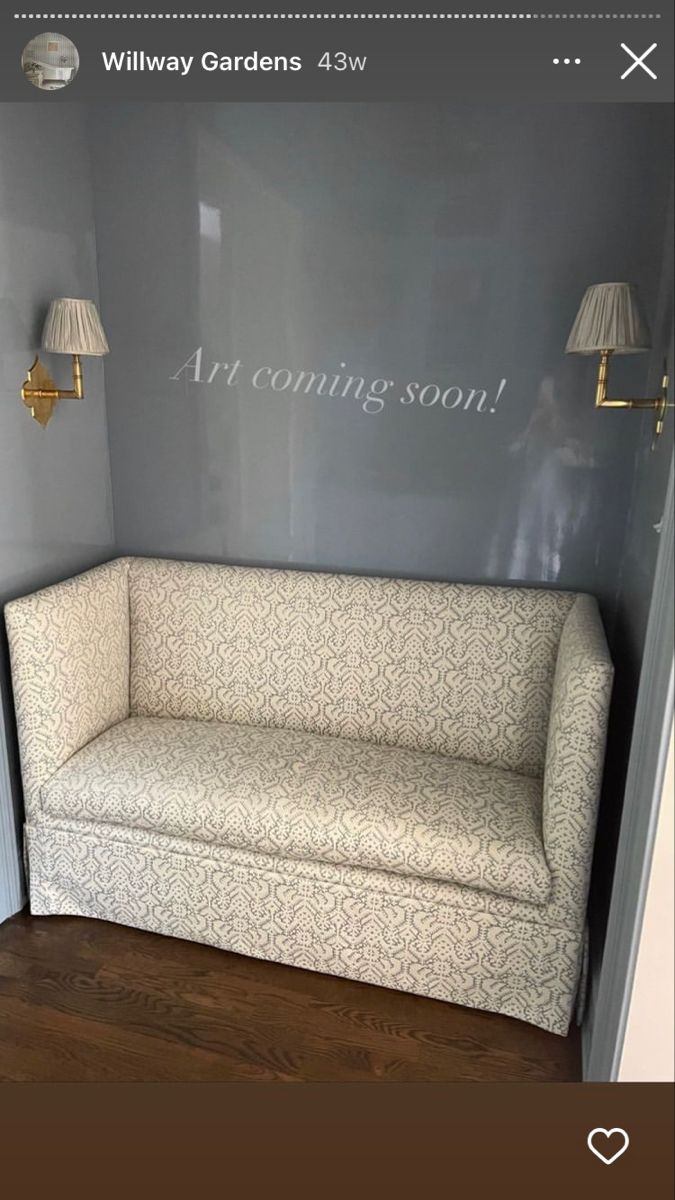 a couch sitting in the corner of a room