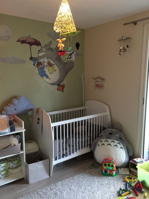 a baby's room with a crib and toys on the floor