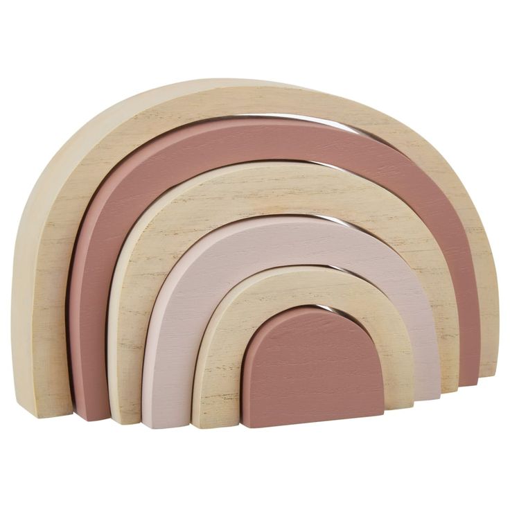 four wooden rainbows in pink, white and beige