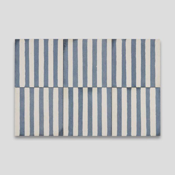 blue and white striped napkins folded on top of each other