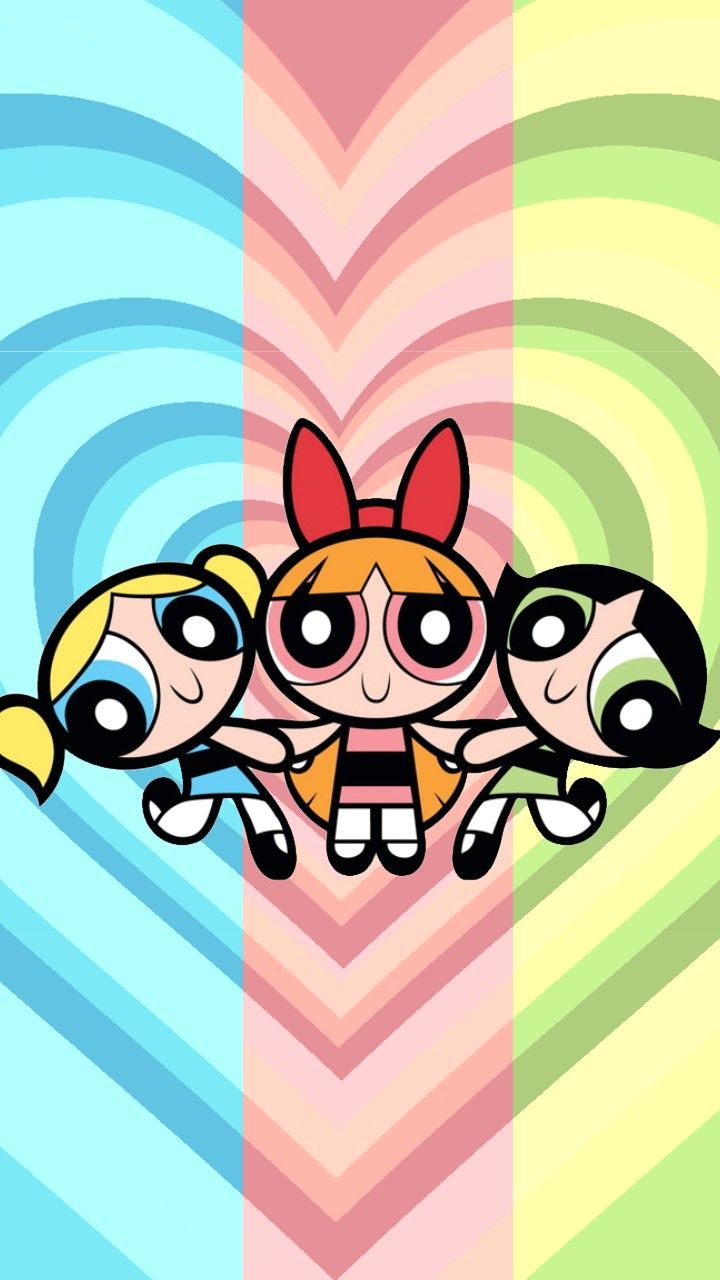 the powerpuff girls are standing in front of a heart