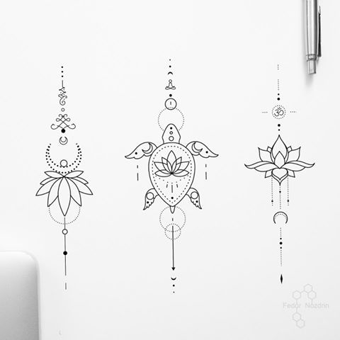 three different designs on the wall next to a pen