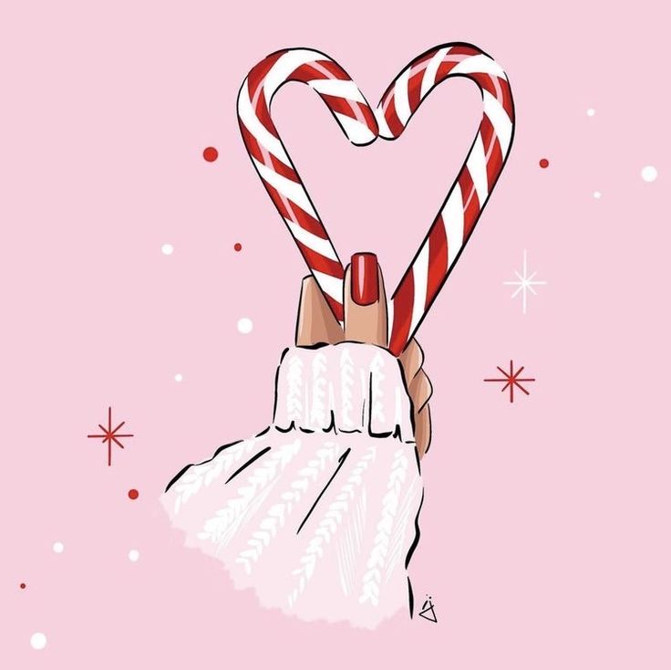 a hand holding two candy canes in the shape of a heart on a pink background