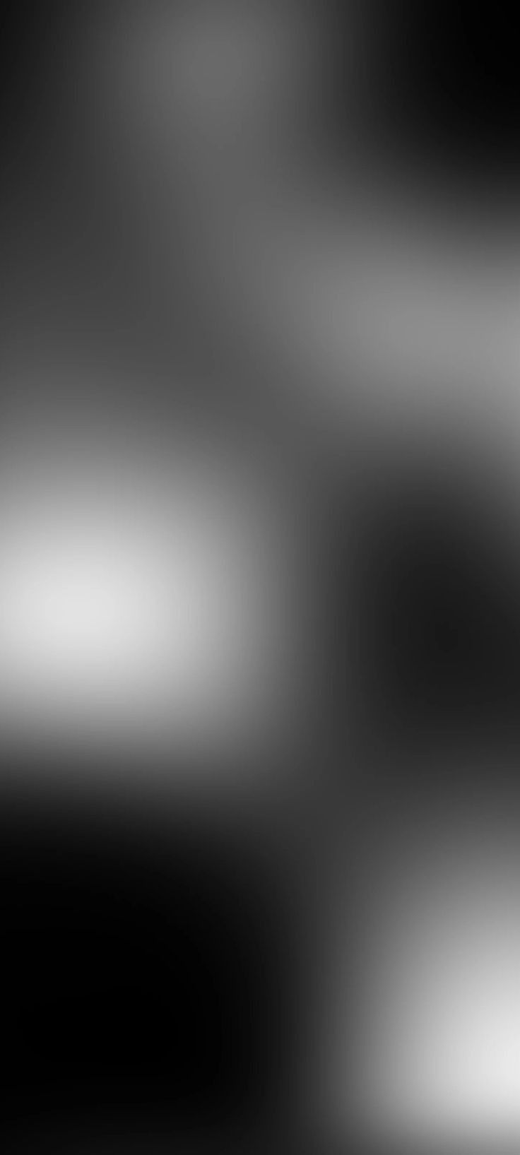 an abstract black and white background with blur