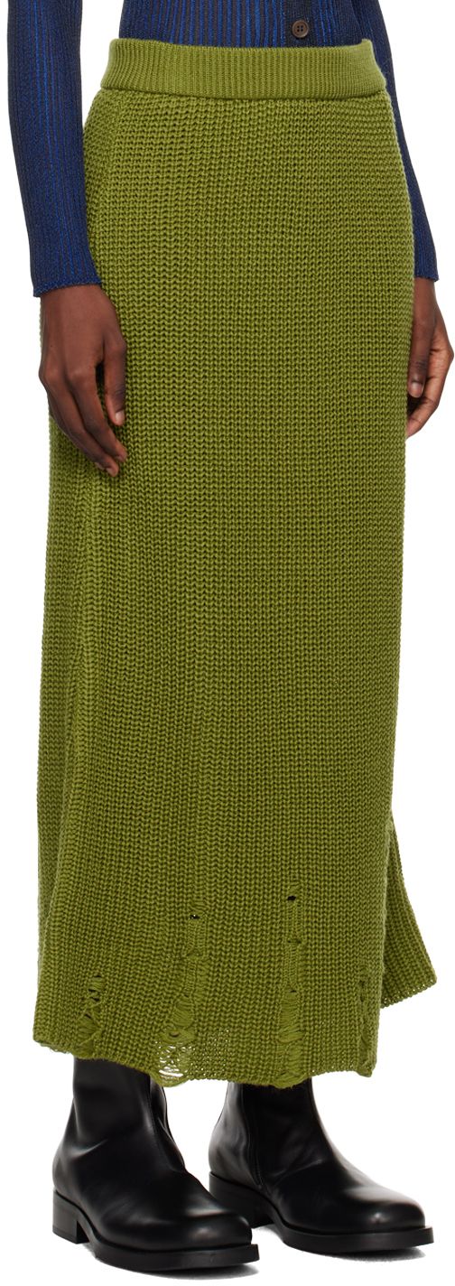 Rib knit wool-blend skirt. · Distressing throughout · Elasticized waistband Supplier color: Green Organza Midi Skirt, Green Plaid Skirt, Green Midi Skirt, Distressed Skirt, Latest Skirts, Black Midi Skirt, Mid Length Skirts, Dream Board, Green Skirt