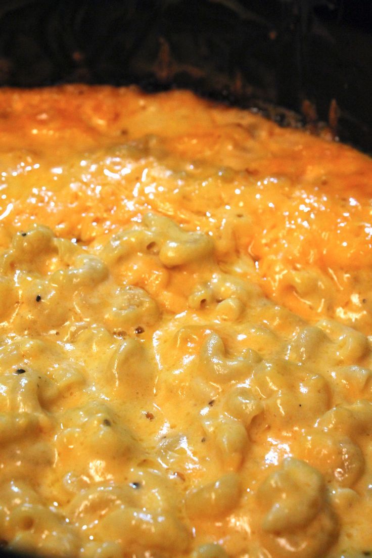 macaroni and cheese is being cooked in an oven