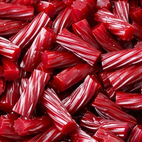 red candy canes are piled up and ready to be eaten