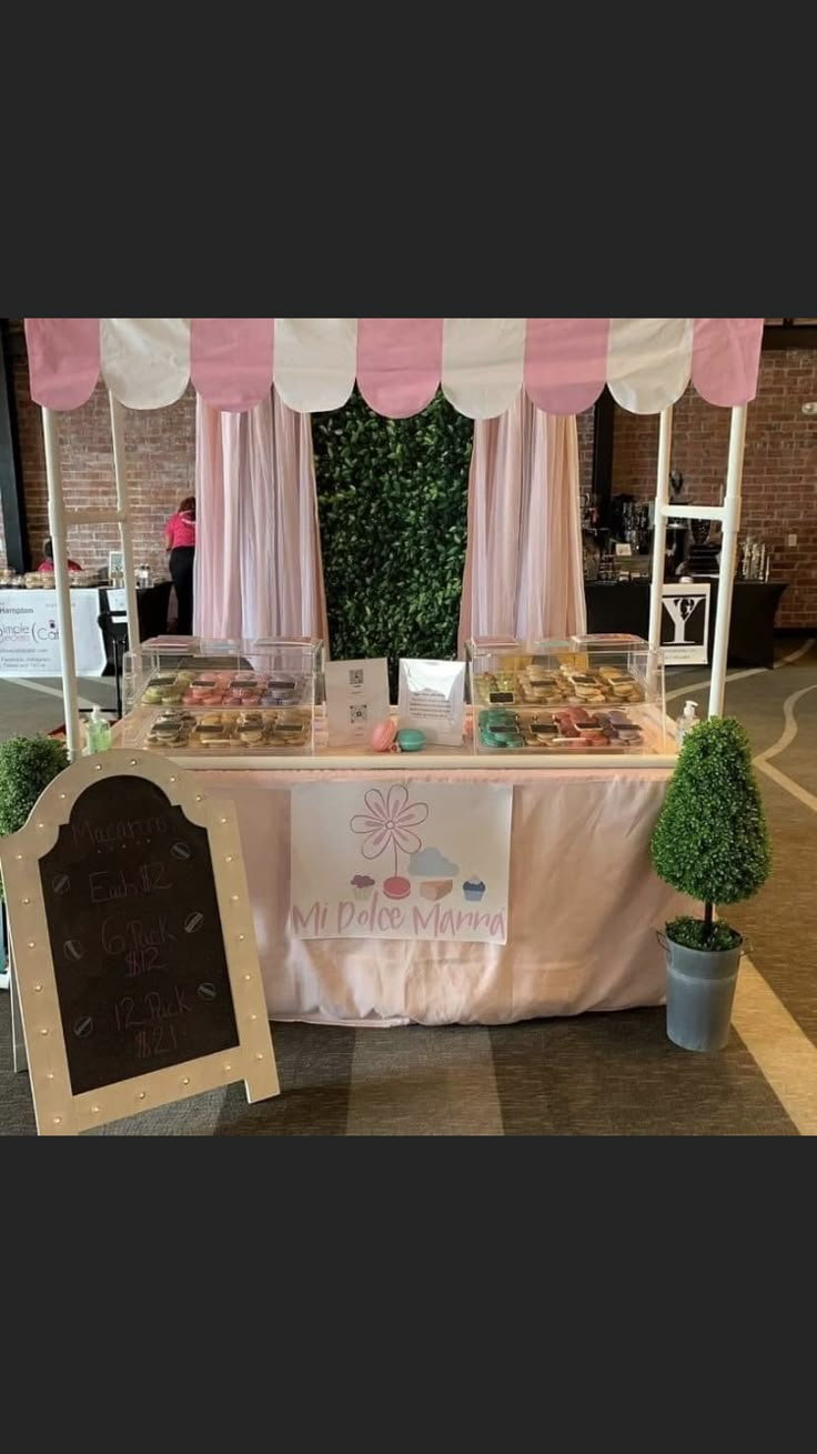 a table with some food on it and a sign next to it that says happy mother's day