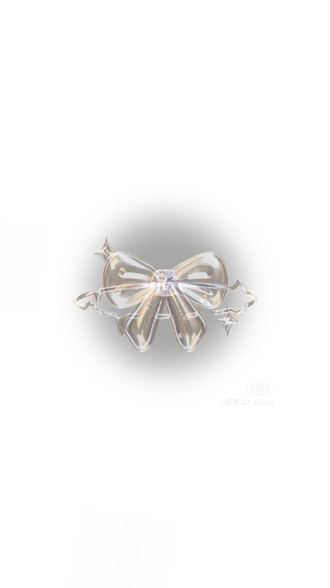 an image of a bow brooch on a white background with the light shining through it