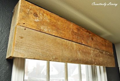 a window sill made out of wooden planks