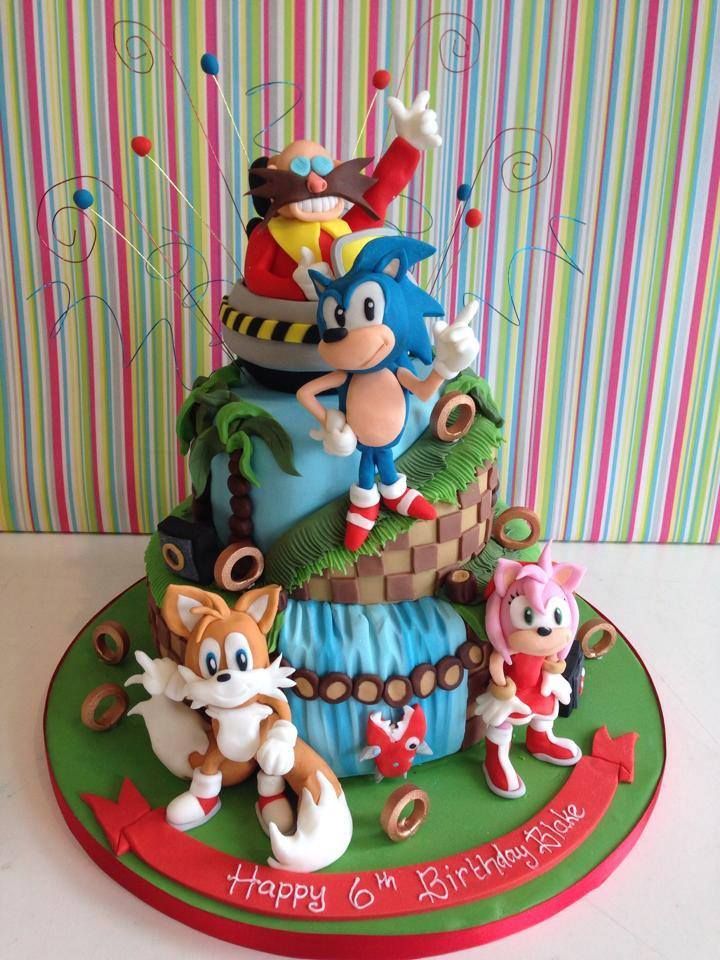 a birthday cake with cartoon characters on it