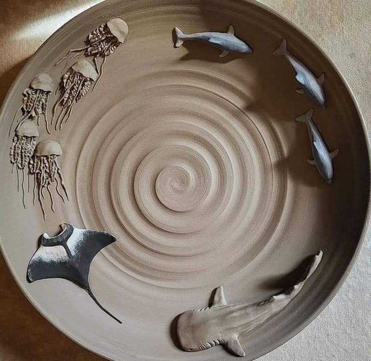 a bowl that has some fish on it