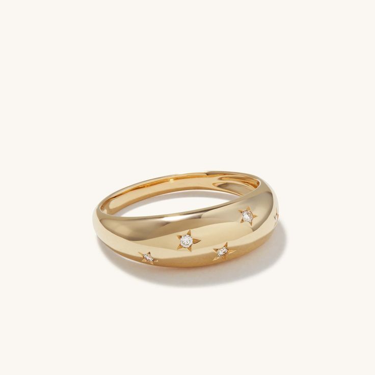 The second of our limited-edition Dôme Rings celebrating our home cities around the world. Inspired by the glitz and glamour of Los Angeles, the LA Dôme is a nod to the city’s eclectic past and our bright future. Handcrafted in 14k yellow gold and set with diamonds. Birthday Gift Ring, Dome Ring, Birthday Ring, Celestial Jewelry, Diamond Star, Domed Ring, Star Ring, Ring Gold, Moissanite Diamonds