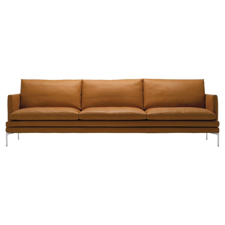 a brown leather couch with chrome legs