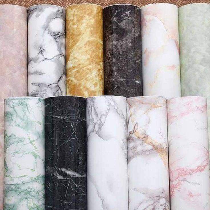 marble paper rolls lined up in different colors